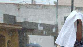 Habitantes del municipio de Culiacán se resguardan de la inundación en su ciudad. (Foto: EFE/Juan Carlos Cruz)