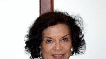 Jagger junto a Francisco Palmieri, Secretario de Estado adjunto de EEUU