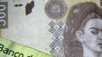 La moneda mexicana registra pérdidas.