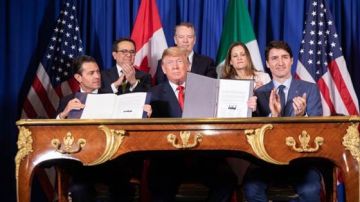President Donald J. Trump is joined by Mexican President Enrique Pena Nieto and Canadian Prime Minister Justin Trudeau at the USMCA signing ceremony Friday, Nov. 30, 2018, in Buenos Aires, Argentina. (Official White House Photo by Shealah Craighead)