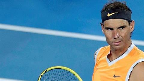 El tenista español Rafael Nadal celebra tras imponerse al estadounidense Frances Tiafoe.