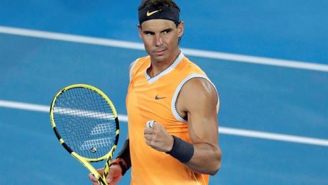 El tenista español Rafael Nadal celebra tras imponerse al estadounidense Frances Tiafoe.