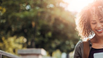 Photo of a woman using smart phone