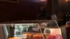 Ethan Nwanganga en uno de sus locales