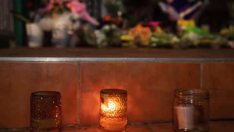 Flowers and candles are placed on the front steps of the Wellington Masjid mosque in Kilbirnie in Wellington on March 15, 2019, after a shooting incident at two mosques in Christchurch. - Attacks on two Christchurch mosques left at least 49 dead on March 15, with one gunman -- identified as an Australian extremist -- apparently livestreaming the assault that triggered the lockdown of the New Zealand city. (Photo by Marty MELVILLE / AFP)        (Photo credit should read MARTY MELVILLE/AFP/Getty Images)