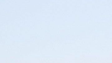 Inmigrantes en puente internacional entre Guatemala y México.