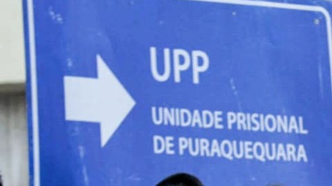 Family members of inmates are pictured praying in front of the Puraquequara Prison facility at Bela Vista community, Puraquequara neighborhood at the city of Manaus, Amazonas state on May 27, 2019. - At least 40 inmates were killed in four jails in northern Brazil on Monday, authorities said, in the latest wave of violence to rock the country's severely overpopulated and dangerous prison system. (Photo by Sandro Pereira / AFP)        (Photo credit should read SANDRO PEREIRA/AFP/Getty Images)