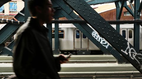 NEW YORK, NY - DECEMBER 05:  People wait for the subway at a stop in Brooklyn two days after a man was pushed to his death in front of a train on December 5, 2012 in New York City. The incident was caught by a photographer and has since raised questions as to why someone didn't help the man before the train struck him. The New York City subway system, with 468 stations in operation, is the most extensive public transportation system in the world. It is also one of the world's oldest public transit systems, with the first underground line of the subway opening on October 27, 1904.  (Photo by Spencer Platt/Getty Images)