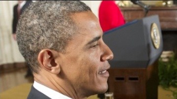 Ausheva en fila pasa saludar a Obama en 2012