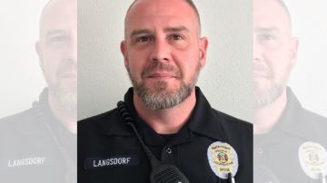 El oficial Michael Langsdorf  murió durante un asalto a una tienda.