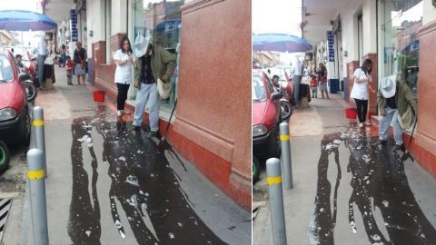 Aseguran que la mujer arrojó el agua a propósito.