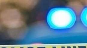 Escena del crimen acordonada por la Policia.