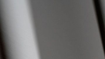 Hands on prison bars