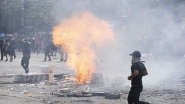 Suspenden futbol por disturbios en Chile.