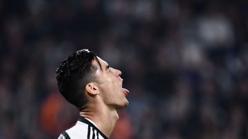 Juventus' Portuguese forward Cristiano Ronaldo reacts after missing a goal opportunity during the UEFA Champions League Group D football match Juventus vs Lokomotiv Moscow on October 22, 2019 at the Juventus stadium in Turin. (Photo by Marco Bertorello / AFP) (Photo by MARCO BERTORELLO/AFP via Getty Images)