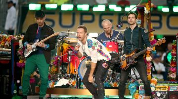 SANTA CLARA, CA - FEBRUARY 07:  (L-R) Jonny Buckland, Chris Martin, Will Champion and Guy Berryman of Coldplay perform onstage during the Pepsi Super Bowl 50 Halftime Show at Levi's Stadium on February 7, 2016 in Santa Clara, California.  (Photo by Christopher Polk/Getty Images)