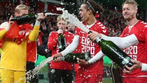 Denmark's players celebrate qualifying for the finals on the pitch after the Group D Euro 2020 football qualification match between Republic of Ireland and Denmark at Aviva Stadium in Dublin, Ireland on November 18, 2019. - The game finished 1-1, Denmark qualifying for the finals. (Photo by Lorraine O'SULLIVAN / AFP) (Photo by LORRAINE O'SULLIVAN/AFP via Getty Images)