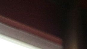 Marisela Hernández y su hijo Juan Pablo Guzmán muestran una foto del padre, Juan Aquino.