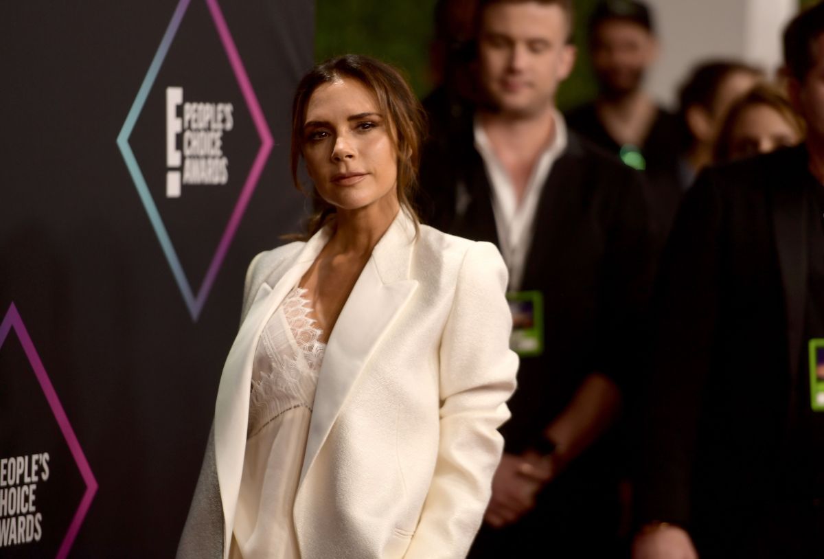 Victoria Beckham brings out her curves with a heart attack dress