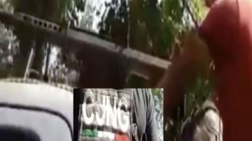 VIDEO: Narcos del CJNG se muestran en vehículo artillado y arsenal en Michoacán