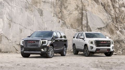 (L to R) 2021 GMC Yukon Denali and AT4