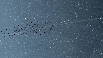 Representación artística de Júpiter y los asteroides troyanos.