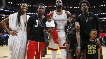 MIAMI, FLORIDA - APRIL 09: Dwyane Wade #3 of the Miami Heat poses for a photo with his wife, Gabrielle Union, nephew, Dahveon Morris, and children, Kaavia James Union Wade, Zaire Wade, Xavier Wade and  Zion Wade after his final career home game at American Airlines Arena on April 09, 2019 in Miami, Florida. NOTE TO USER: User expressly acknowledges and agrees that, by downloading and or using this photograph, User is consenting to the terms and conditions of the Getty Images License Agreement.  (Photo by Michael Reaves/Getty Images)