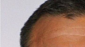 Genaro García Luna y Joaquín "El Chapo" Guzmán Loera.