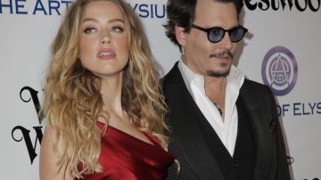 Johnny Depp junto a su ex esposa Amber Heard.