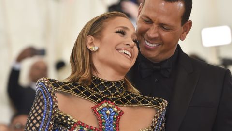 TOPSHOT - Jennifer Lopez and Alex Rodriguez arrive for the 2018 Met Gala on May 7, 2018, at the Metropolitan Museum of Art in New York. - The Gala raises money for the Metropolitan Museum of Arts Costume Institute. The Gala's 2018 theme is Heavenly Bodies: Fashion and the Catholic Imagination. (Photo by Hector RETAMAL / AFP) (Photo credit should read HECTOR RETAMAL/AFP via Getty Images)