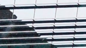 Camiones de refrigeración alineados cerca de las oficinas del médico forense en Nueva York para servir como morgue.