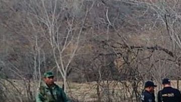 HUETAMO (MÉXICO), 23/05/2020.- Fotografía de una camioneta donde fueron encontrados doce cadáveres, este sábado, en Huetamo, estado de Michoacán (México). Narcotraficantes abandonaron los cuerpos de 12 hombres en una camioneta tras asesinarlos a balazos en el límite de los estados de Michoacán y Guerrero, en el occidente de México, revelaron autoridades este sábado.