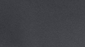 Autos de la Policía arden durante los disturbios en el oeste de L.A.