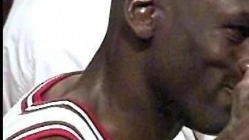 CHICAGO, UNITED STATES:  Chicago Bulls player Michael Jordan (L) congratulates teammate Steve Kerr after Kerr's last-second basket against the Utah Jazz in game six of the 1997 NBA Finals at the United Center in Chicago, IL.  The Bulls captured the NBA championship by defeating the Jazz 90-86.     (ELECTRONIC IMAGE)     AFP PHOTO/Robert SULLIVAN (Photo credit should read ROBERT SULLIVAN/AFP via Getty Images)