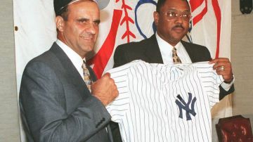 NEW YORK, UNITED STATES:  Joe Torre (L) was introduced as the newest New York Yankees manager by general manager Bob Watson (R) at Yankee Stadium 02 November in New York. Torre, 55,  replaces Buck Showalter and becomes the Yankees 21st manager since the team was bought by George Steinbrenner in 1973. AFP PHOTO (Photo credit should read HENNY RAY ABRAMS/AFP via Getty Images)