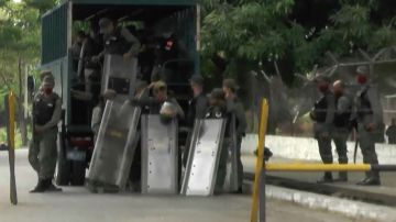 Video grab of members of Bolivarian National Guard as they are deployed outside Los Llanos prison, in Guanare, Portuguesa state, Venezuela on May 2, 2020, after a riot occured. - The death toll from a prison riot in western Venezuela has risen to at least 47, with 75 wounded, an opposition politician and prisoners' rights group said Saturday. With the coronavirus pandemic raging, visits from family and friends -- who often bring food and medicine to inmates -- have been greatly reduced. (Photo by - / AFPTV / AFP) / BEST QUALITY AVAILABLE (Photo by -/AFPTV/AFP via Getty Images)