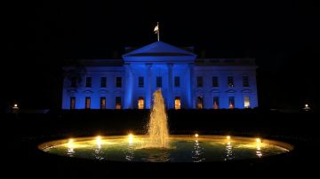 WASHINGTON, DC - APRIL 02: The White House is bathed in blue light in honor of World Autism Awareness Day April 02, 2020 in Washington, DC. World Autism Awareness Day encourages member states of the United Nations to elevate awareness about people with autistic spectrum disorders throughout the world. (Photo by Win McNamee/Getty Images)