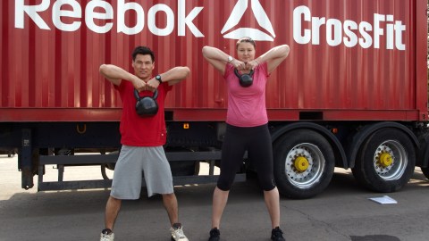 MOSCOW, RUSSIA - MAY 15: Reebok Ambassadors Batu Khasikov and Dinara Safina pose for pictures joining forces to help launch Reebok's The Sport Of Fitness Has Arrived campaign in Russia. The pair hosted a public CrossFit workout, a revolutionary strength and conditioning programme, against the backdrop of Moscow's iconic Gorky Park on May 15 in Moscow, Russia. (Photo by Oleg Nikishin/Getty Images for Reebok)