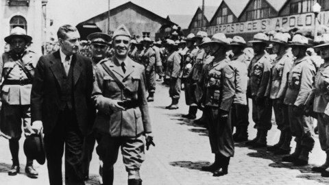 Portuguese dictator Antonio De Oliveira Salazar (1889 - 1970) reviews troops about to embark for the African colonies of the Portuguese Republic, circa 1950. (Photo by Evans/Three Lions/Hulton Archive/Getty Images)
