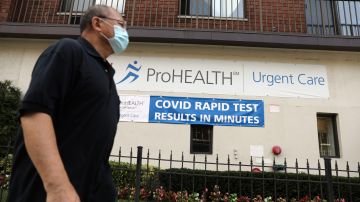 NEW YORK, NEW YORK - AUGUST 27: A sign displays a new rapid coronavirus test on the new Abbott ID Now machine at a ProHEALTH center in Brooklyn on August 27, 2020 in New York City. The portable Abbott ID Now uses a nasal swab to detect acute and infectious cases of COVID-19. ProHEALTH is offering the new service, which can deliver a test result in a s little as 15 minutes, at its centers in the tri-state area. (Photo by Spencer Platt/Getty Images)