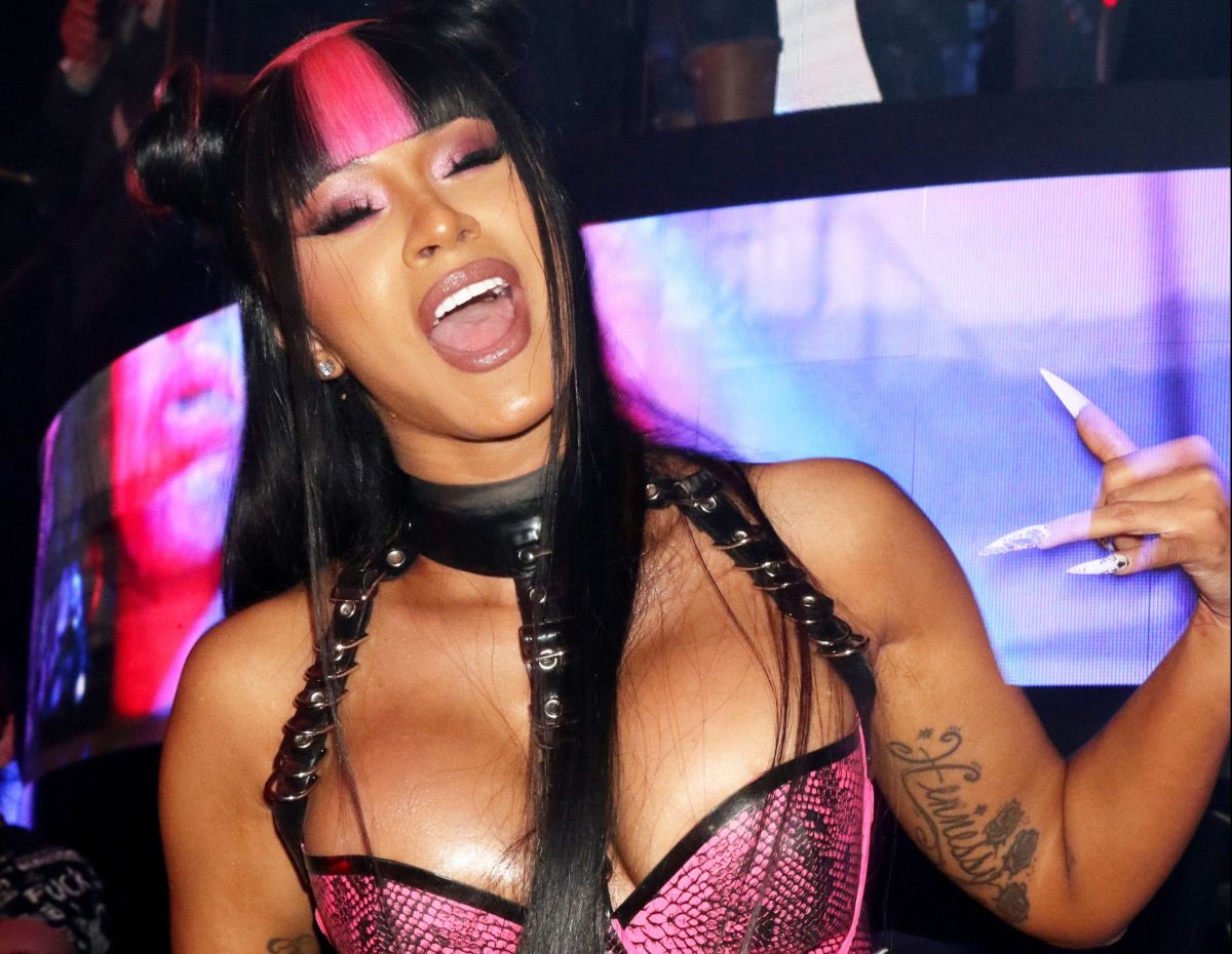 Cardi B shows her rear guard modeling with a heart attack bodysuit