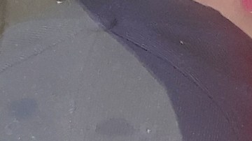 Gorras electorales en vitrina de Manhattan