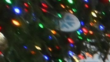 People walk past the New York Stock Exchange (NYSE) and 'Fearless Girl' statue at Wall Street on December 9, 2020 in New York City. (Photo by Angela Weiss / AFP) (Photo by ANGELA WEISS/AFP via Getty Images)