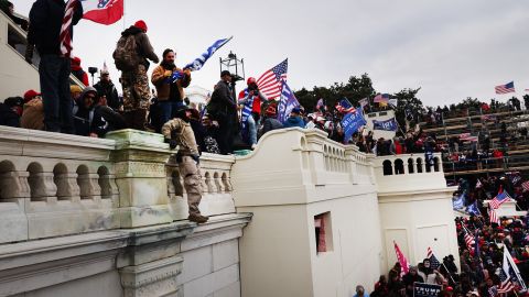 WASHINGTON, DC - JANUARY 06: Thousands of Donald Trump supporters storm the United States Capitol building following a "Stop the Steal" rally on January 06, 2021 in Washington, DC. The protesters stormed the historic building, breaking windows and clashing with police. Trump supporters had gathered in the nation's capital today to protest the ratification of President-elect Joe Biden's Electoral College victory over President Trump in the 2020 election. (Photo by Spencer Platt/Getty Images)