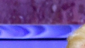 El expresidente Trump, uno de su hijos y Allen Weisselberg.