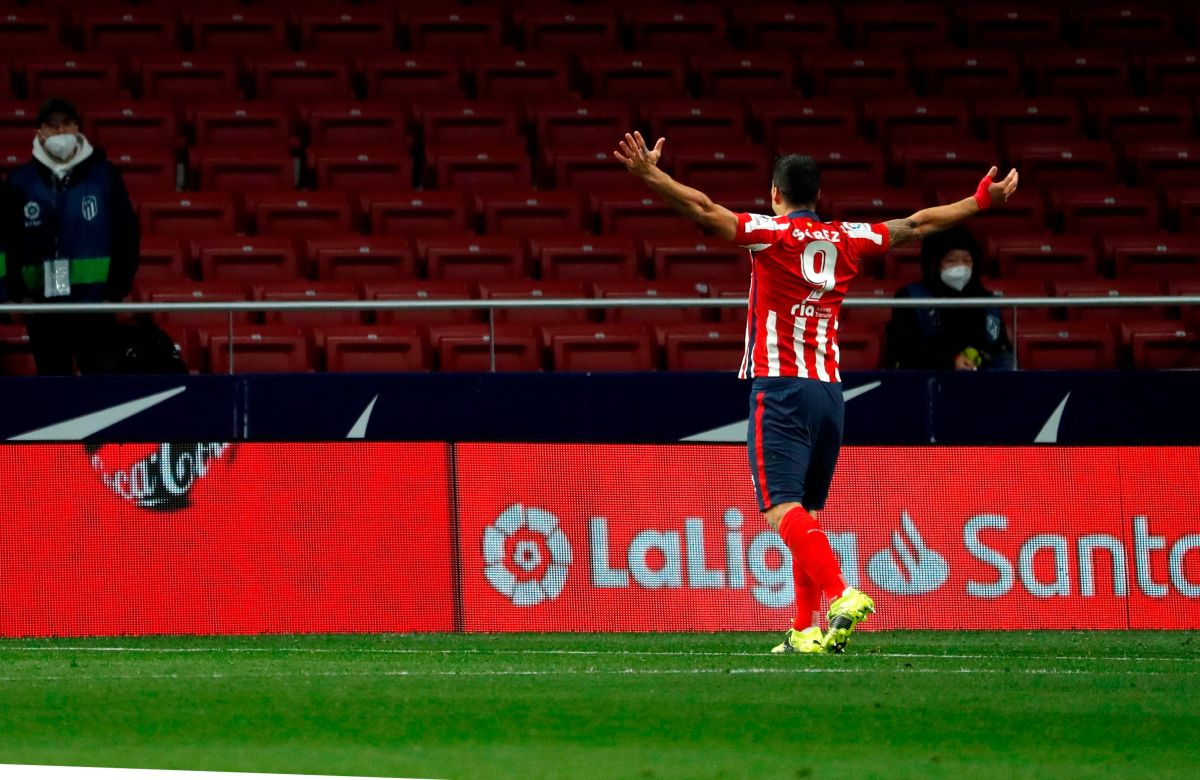 Luis Suárez celebra el gol del triunfo atlético.