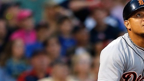BOSTON, MA - MAY 17:  Miguel Cabrera #24 of the Detroit Tigers watches the flight of his home run against the Boston Red Sox in the third inning at Fenway Park on May 17, 2014 in Boston, Massachusetts.  (Photo by Jim Rogash/Getty Images)