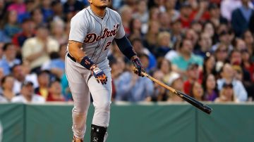 BOSTON, MA - MAY 17:  Miguel Cabrera #24 of the Detroit Tigers watches the flight of his home run against the Boston Red Sox in the third inning at Fenway Park on May 17, 2014 in Boston, Massachusetts.  (Photo by Jim Rogash/Getty Images)