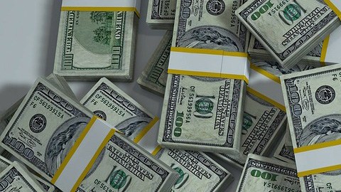 Fajos de billetes de dólares.
