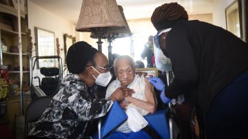 Sarah Butler, who just just turned 108 years old, receives the Johnson & Johnson vaccine from the FDNY's homebound vaccination program at her home in Harlem on Tuesday, April 6, 2021. Michael Appleton/Mayoral Photography Office